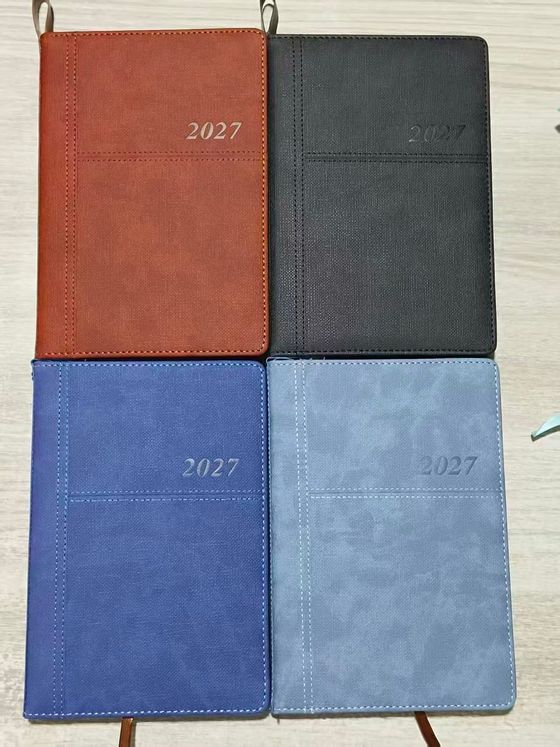 2027 dated diaries in tan, black, blue and dusty-blue textured PU covers